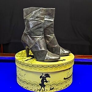 Patched leather ankle boots